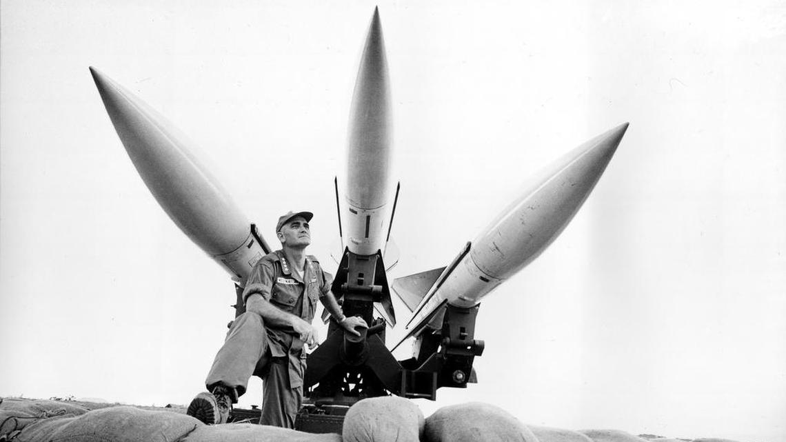 Gen. William C. Westmoreland, commander of U.S. Forces in South Vietnam, stands beneath a three combat-ready Hawk anti-aircraft missiles at Da Nang, Vietnam, in this 1965 photo.