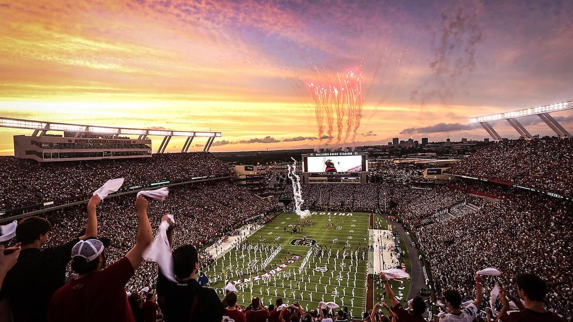 Fans celebrate the first game of the USC football season at Williams-Brice Stadium.