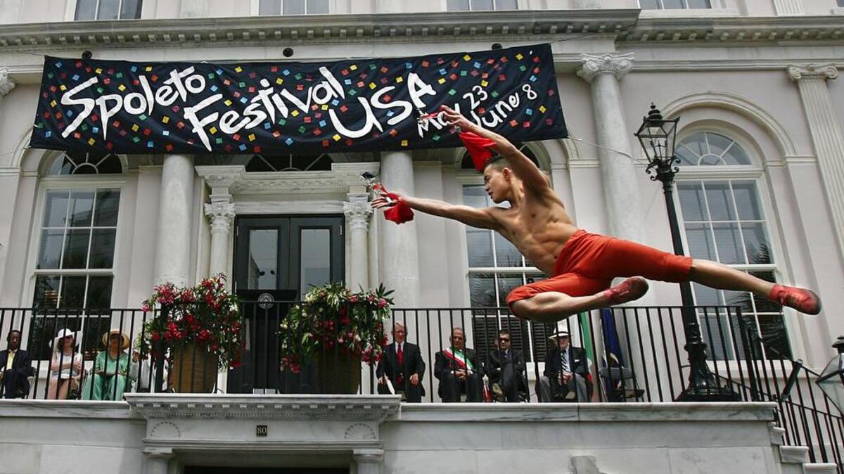 A martial artist member of the Dalian Acrobatic Troupe performs at the opening ceremony of the 32nd Spoleto Festival in front of City Hall, Friday, May 23, 2008, in Charleston, S.C.. The Spoleto Festival USA renewed ties with the Festival of Two Worlds in Spoleto, Italy, on Friday amid brass fanfares, jazz, tumbling acrobats and a shower of white confetti.