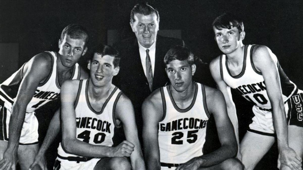 From left, Billy Walsh, Tom Owens, coach Frank McGuire, John Ribock, and John Roche.