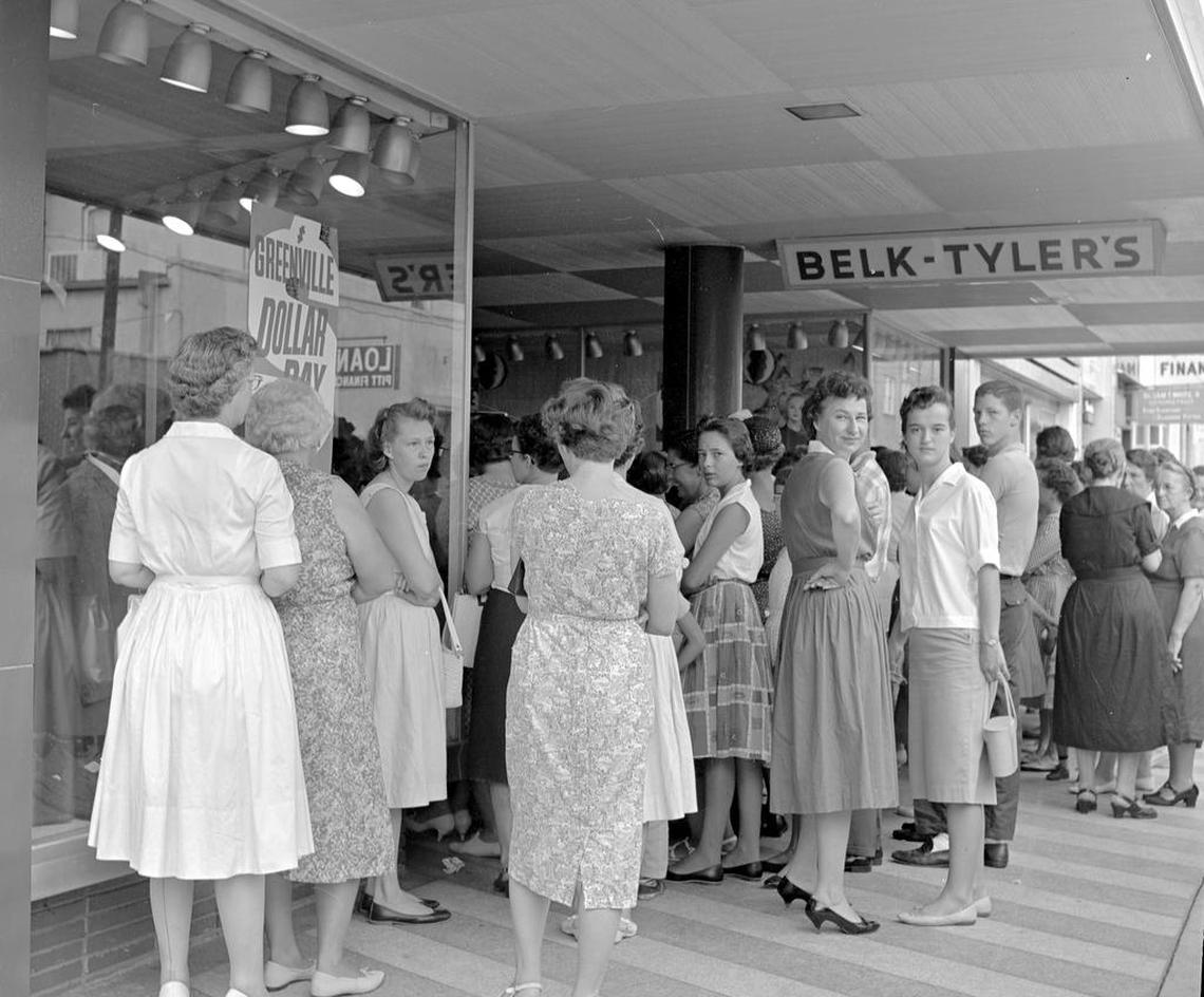 Crowd forms outside of Belk-Tyler Department store in Greenville for the beginning of Dollar Day sales in August 1960.