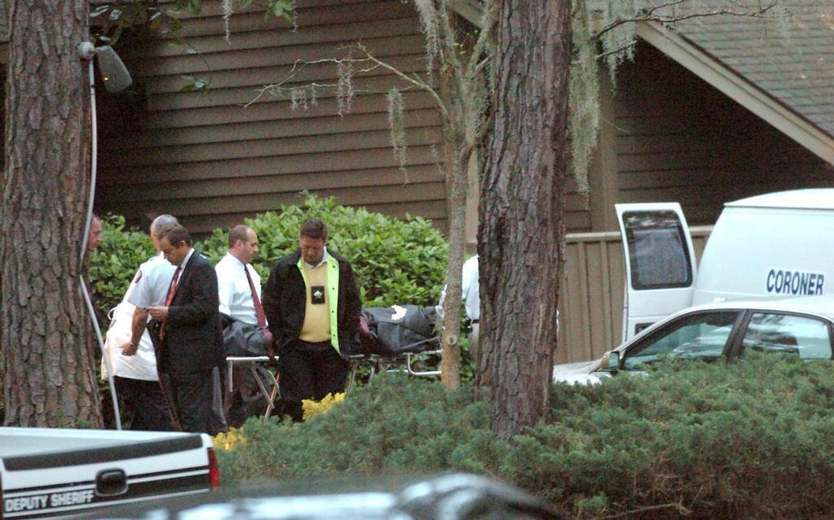 Beaufort County investigators remove the body of Dennis Ray Gerwing from a Sea Pines Villa who was found dead, apparently by suicide on March 11, 2008.