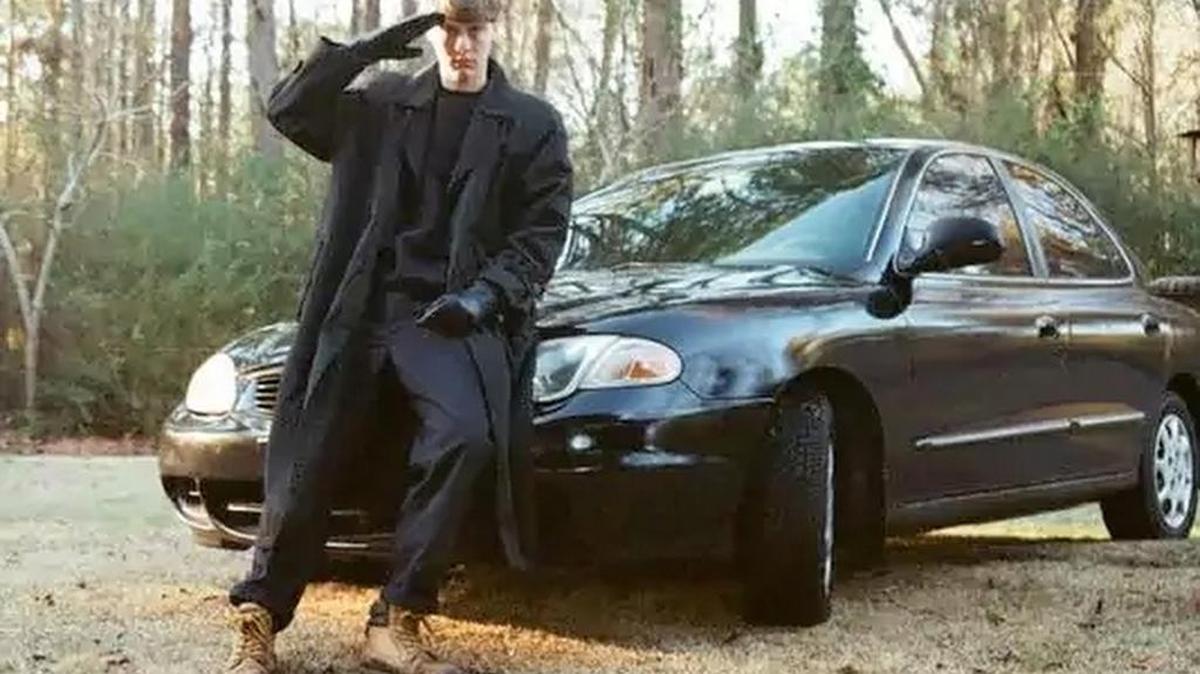 Dylann Roof, convicted of the Charleston church shootings, poses with his car in an undated self-portrait.