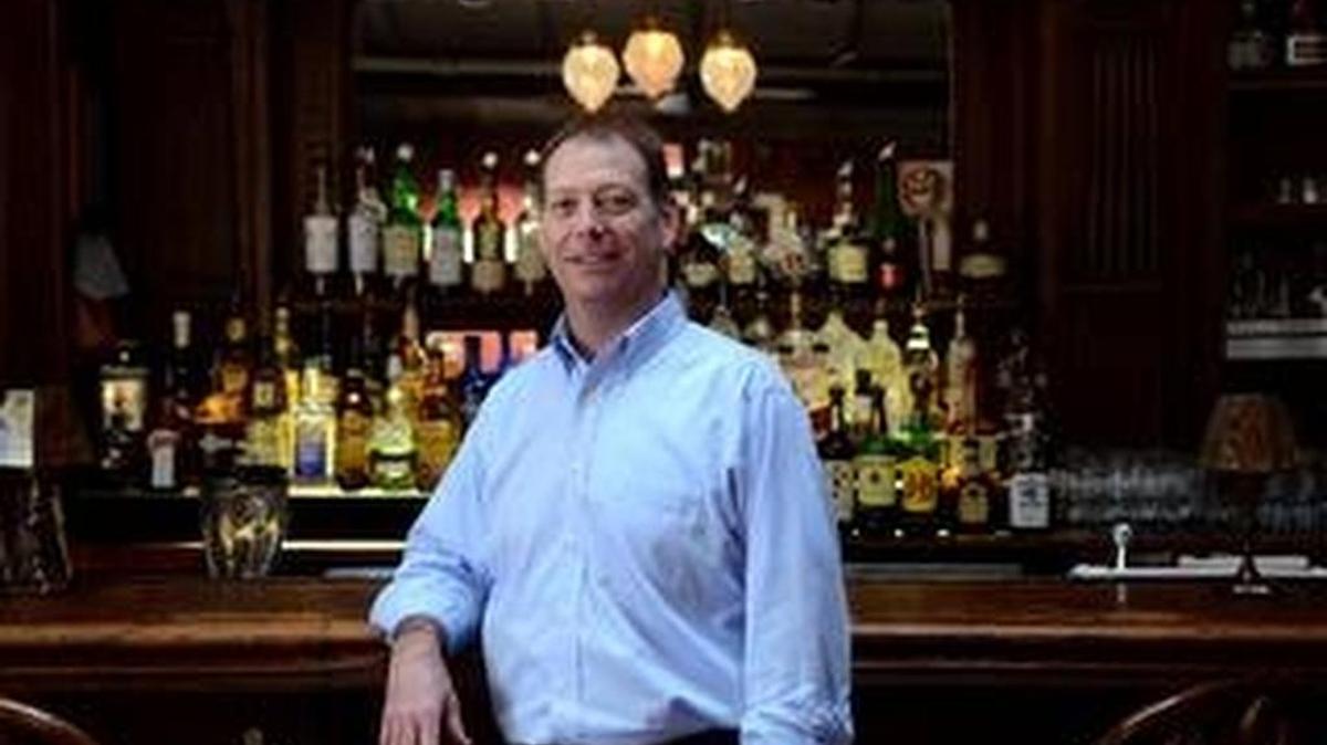 
Eric Thompson, general manager at CQ?s Restaurant, stands for a portrait at the bar inside of the restaurant on Thursday afternoon on Hilton Head Island. Thompson has never seen the Blue Lady that is said to haunt the restaurant but he has heard footsteps, seen the lights flicker and witnessed the liquor bottles behind the bar begin to shake with no explanation. 
