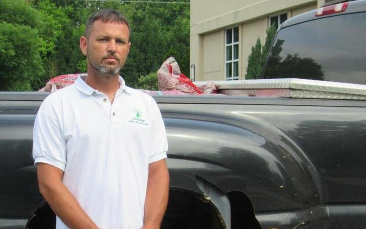 
Eddie Nivens of York stands next to his truck that was stolen last week, then later recovered. 
