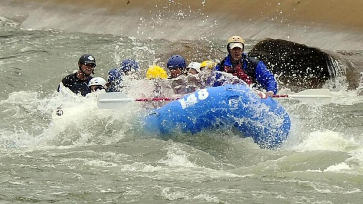 Rafters make their way through the course at the U.S. National Whitewater Center in May.