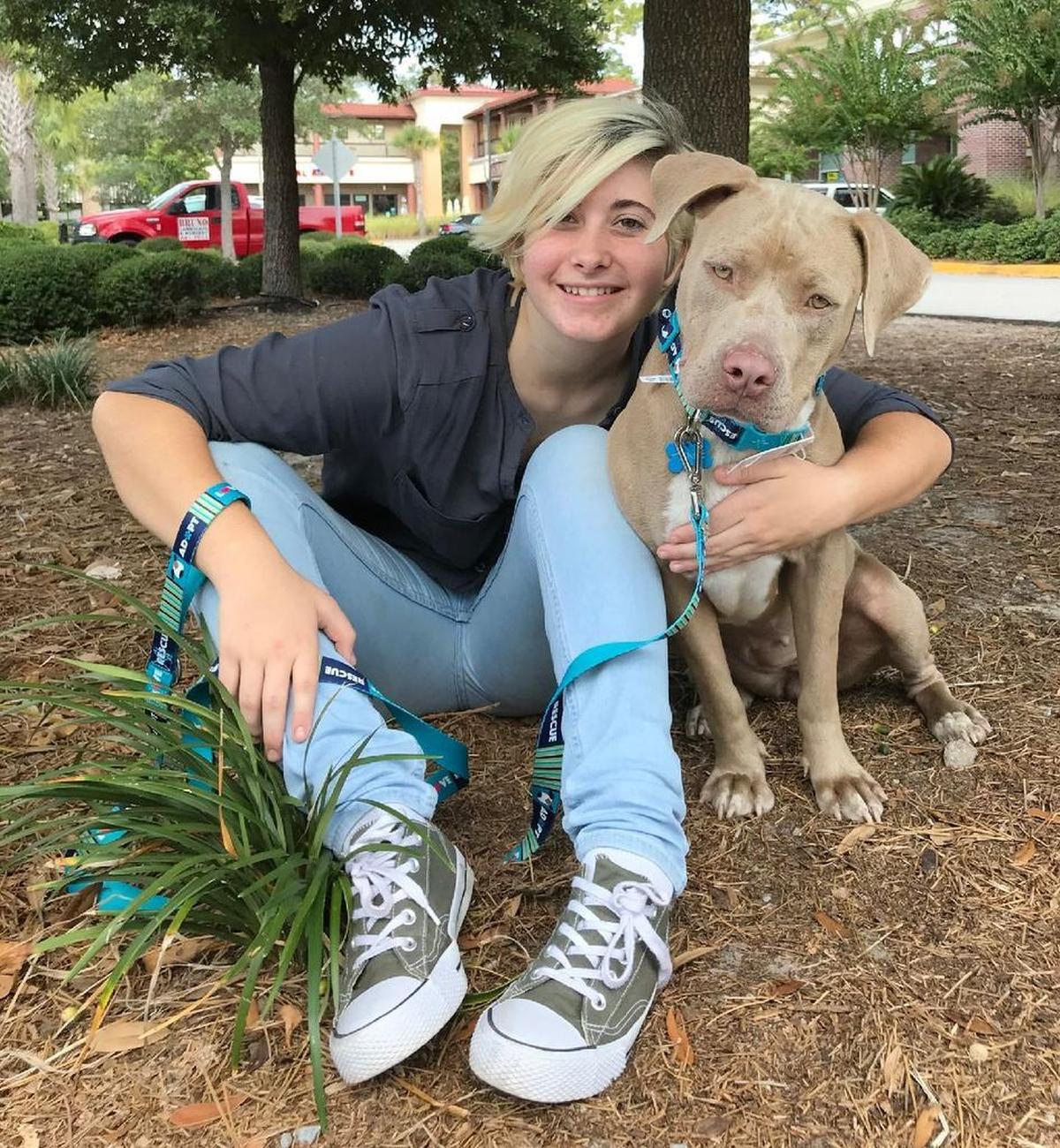 Naomi Gosdin and her service pit bull Twinkie.