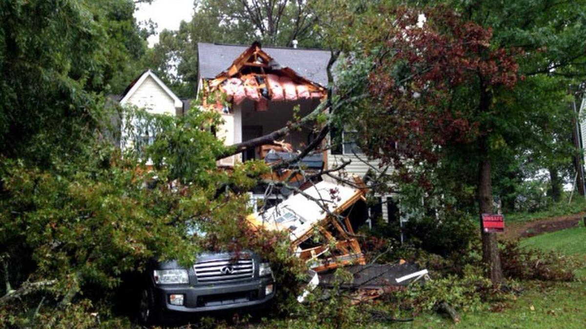 
A toppled tree severely damaged a home on Long Grass Court in northwest Charlotte Saturday.

