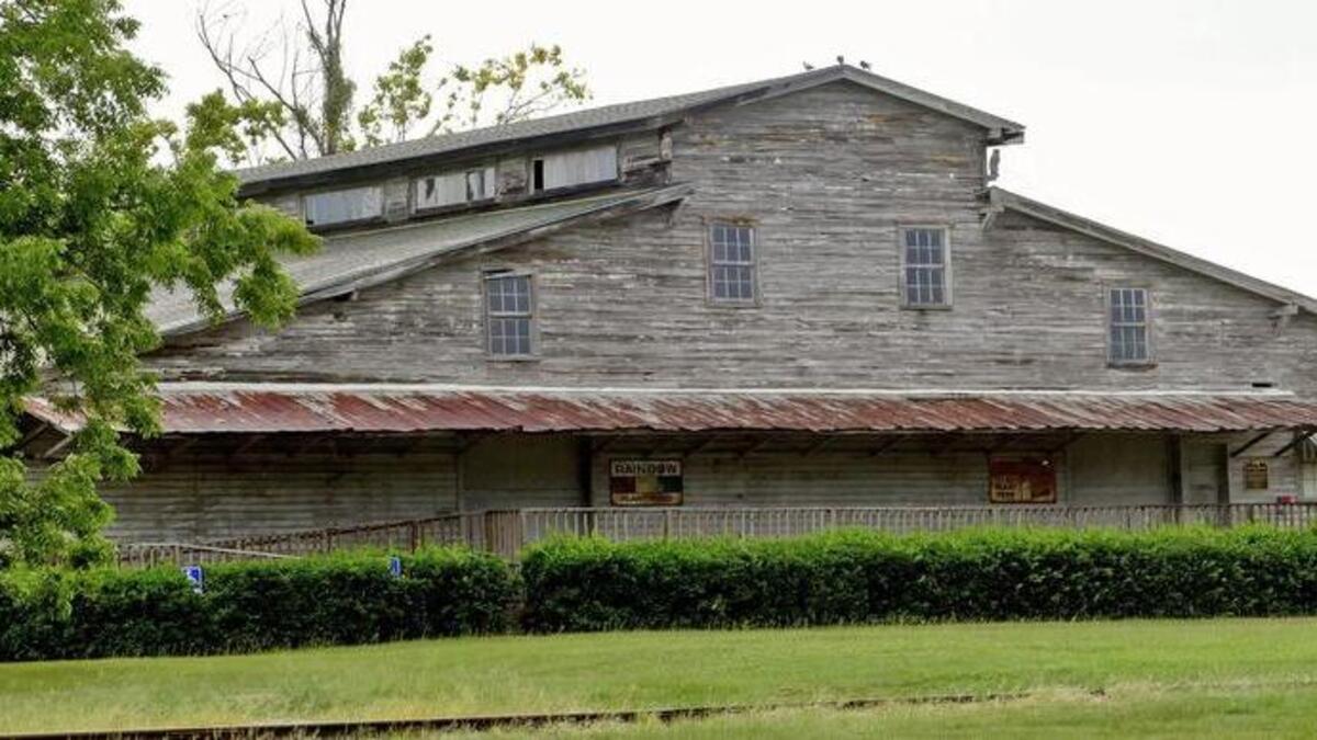The Burroughs Co. and the City of Conway hope to marry their visions for redeveloping the city, including the addition of a city square, additional retail spaces and possibly a boutique hotel. The Peanut Warehouse, scene of many events and home to Strom's Porch, is one of the main structures in this area.