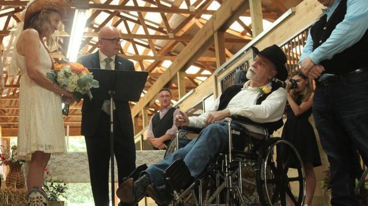 Friends and family gathered for the wedding of Frances Underwood and Floyd Pepper inside the Easley horse barn he built with a friend.