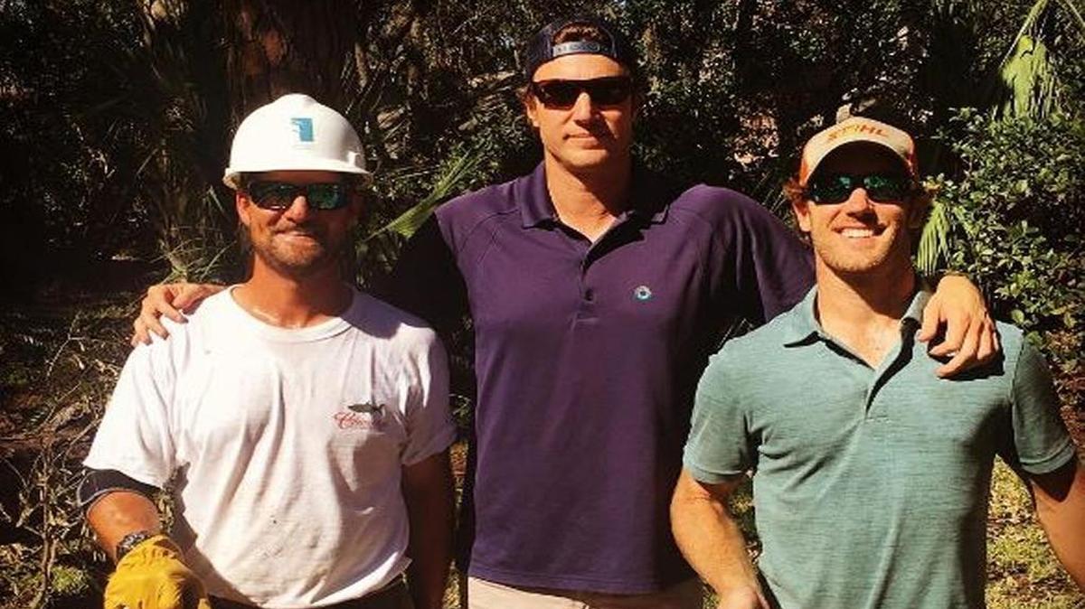 “Southern Charm” star Shep Rose poses with two friends on Thursday when he visited Beaufort County.