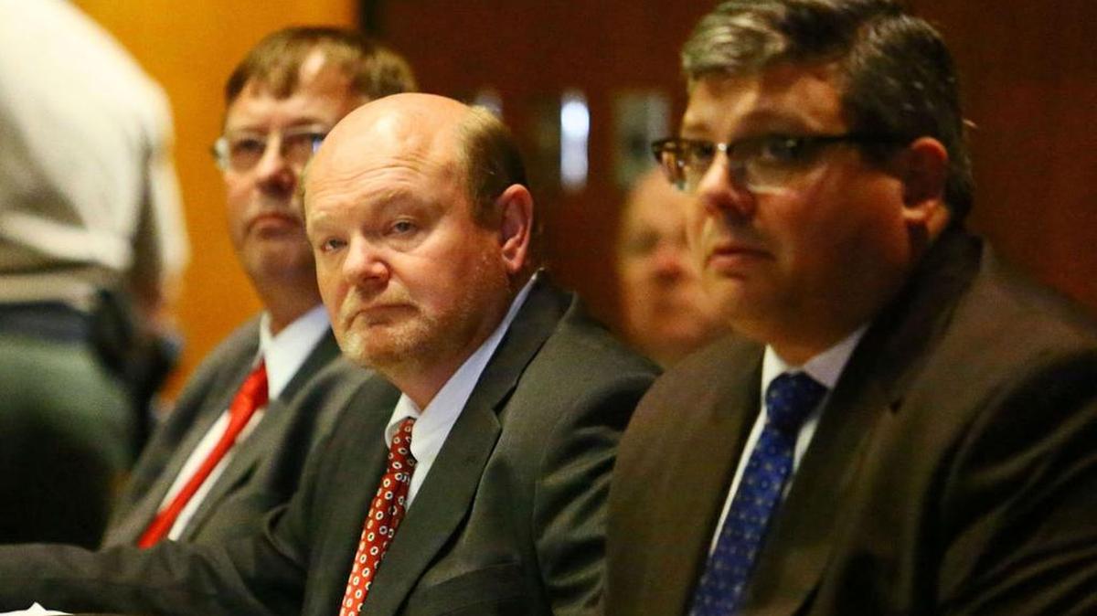Dusan Fridl (center) and Hemming Hemmingsen (left) on the first day of trial January 25, 2016. The two were charged with unlawfully flying a helicopter allegedly owned by the Florence County Sheriff's Department. They were cleared of these charges.