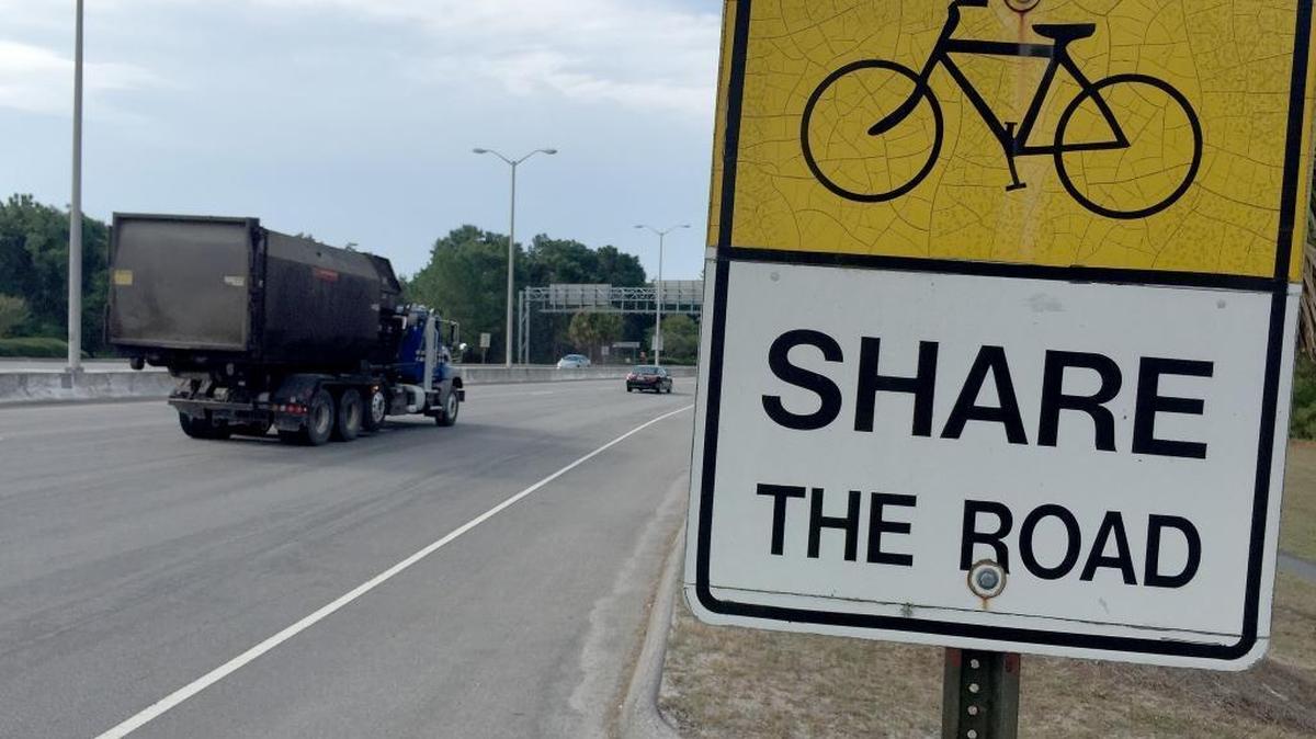 A “Share the road” sign warns motorists to watch out for bicyclists on the Cross Island Parkway on Hilton Head Island the morning of Aug. 19, 2016.