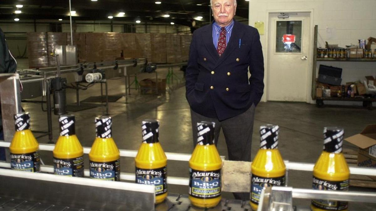 A 2000 file photo shows Maurice Bessinger at his barbecue sauce bottling operation.
