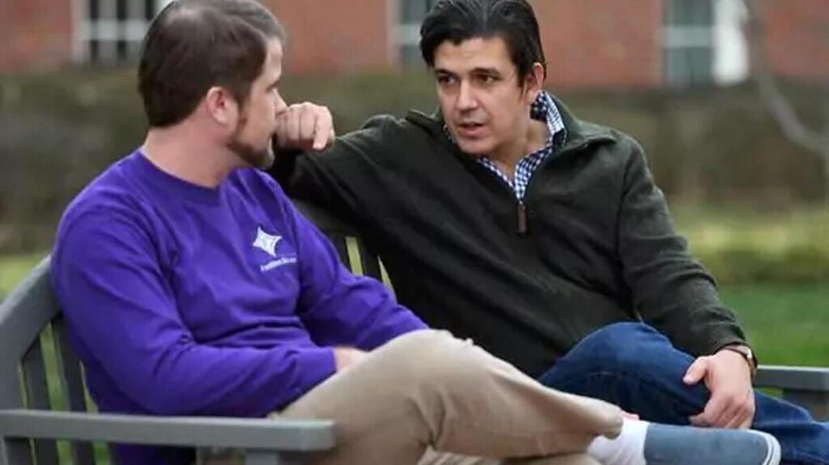 Furman political science professor Akan Malici, right, talks with student Vernon Cooper on campus on Thursday, February 2, 2017. Malici who is Muslim, feels that people have a false understanding of Muslims, in part, because they do not really know Muslims.