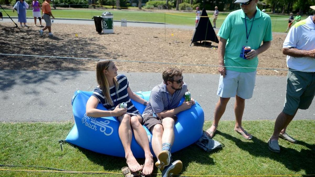 Spectators enjoy the second round of the RBC Heritage on Friday at Harbour Town Golf Links in Sea Pines on Hilton Head Island, S.C.