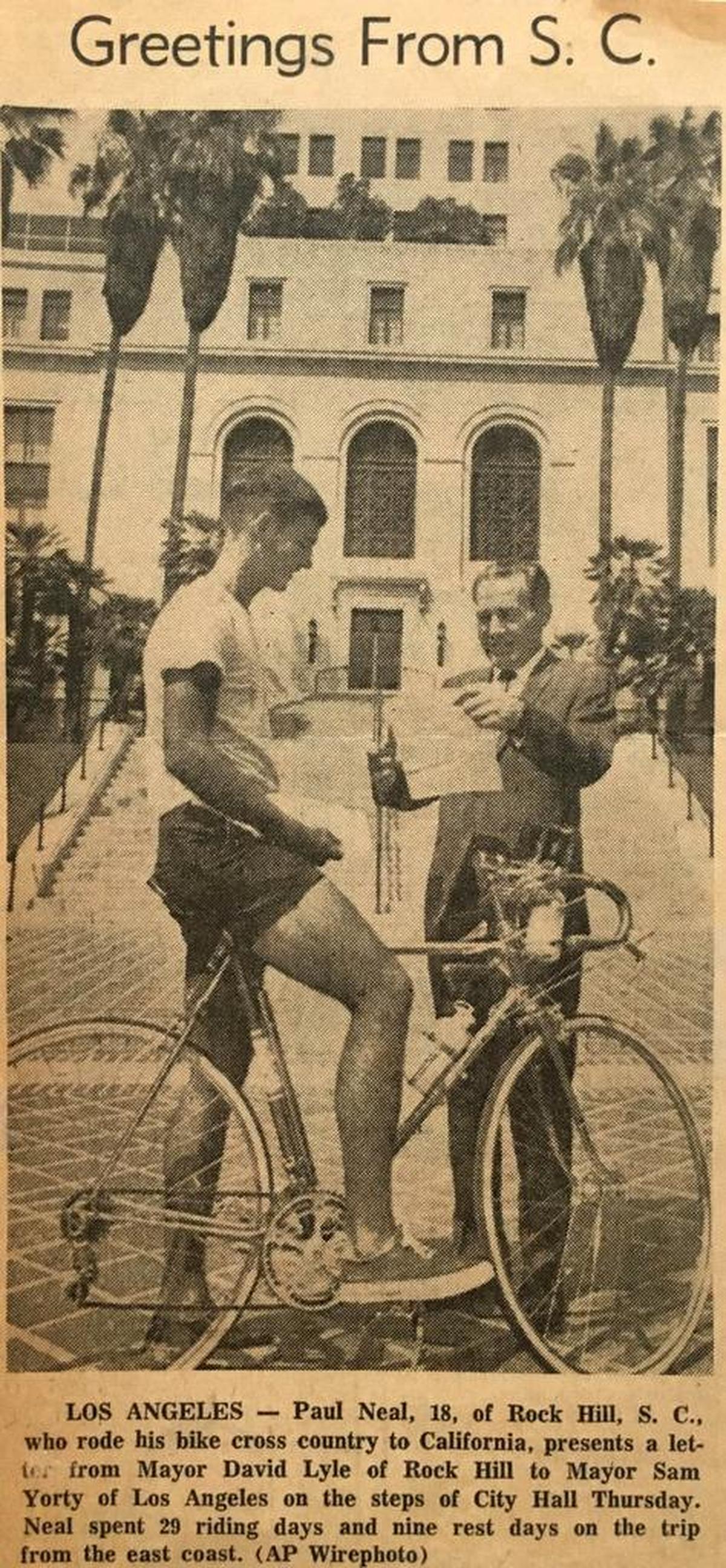 Paul Neal delivers a letter of introduction from the city of Rock Hill to Los Angles Mayor Sam Yorty at the conclusion of his 3,000-mile bike ride in 1967. Neal, who takes off Monday on a repeat trip, will carry a similar letter to the current Los Angeles mayor.
