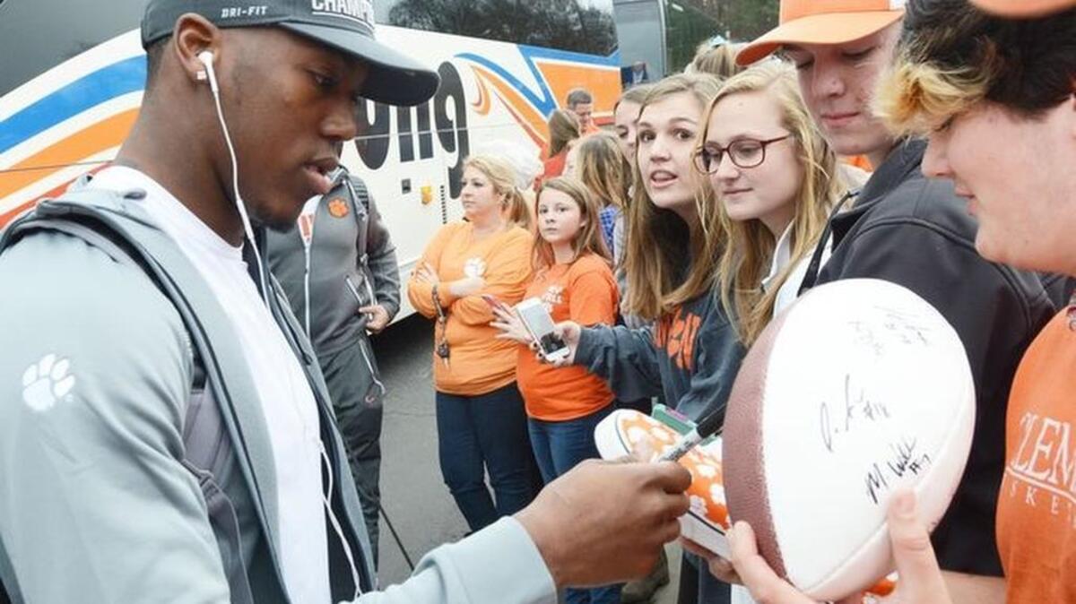 The Clemson football team returned home from the Orange Bowl on Friday to a hero’s welcome outside Death Valley, as a cheering crowd of about 2,000 turned out to great the players and coaches.