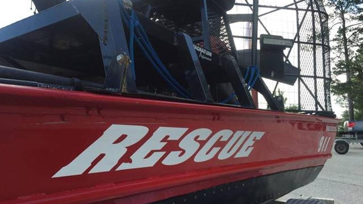 A water rescue boat sits ready for use at the Broad River boat landing during an S.C. DNR search operation for a missing boater Friday.