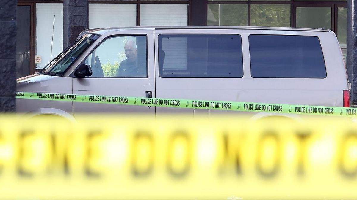 Horry County Police work the scene of a double homicide in Socastee Plaza on Monday, July 11, 2016. One man is face-down on the driver's side of a gold van and another man is slumped over in the passenger side of the van. Lt. Raul Denis of the Horry County Police said as of 9:30 a.m. no cause of death could be determined for either man. Socastee Plaza is located off S.C. 707 across fro CresCom Bank. Over a month ago a woman was found stabbed to death inside the Maytag Laundromat in the same shopping center.