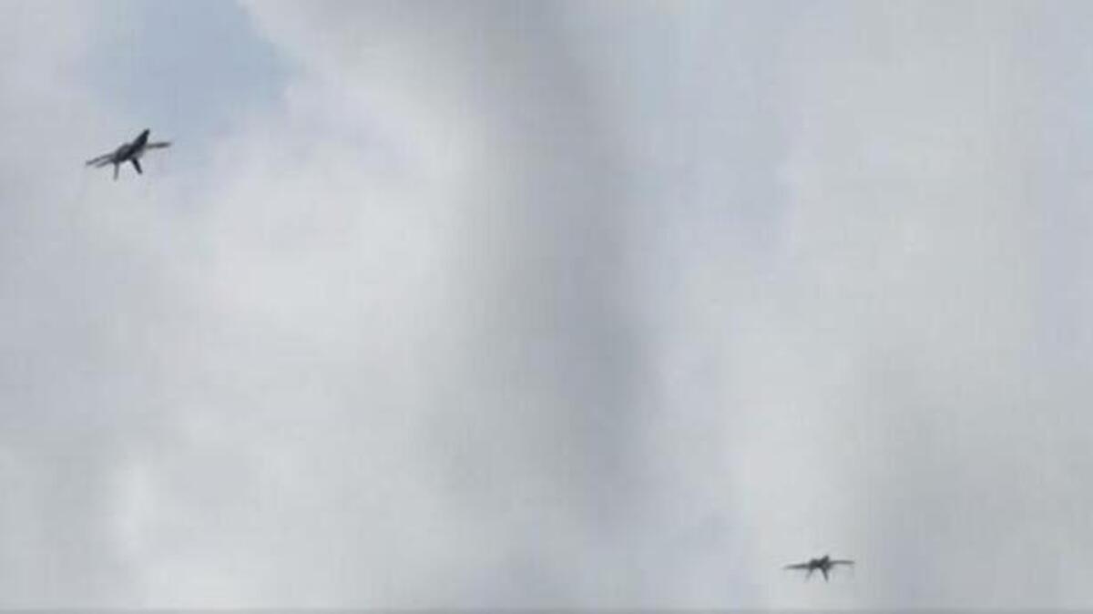 Marine Capt. Jeff Kuss’ F/A-18 aircraft descends below the tree line shortly after take off during a practice run prior to the Smyrna Air Show on June 2, 2016, in Smyrna, Tenn. The jet crashed moments later, killing Kuss. This image is taken from video recorded by bystanders.