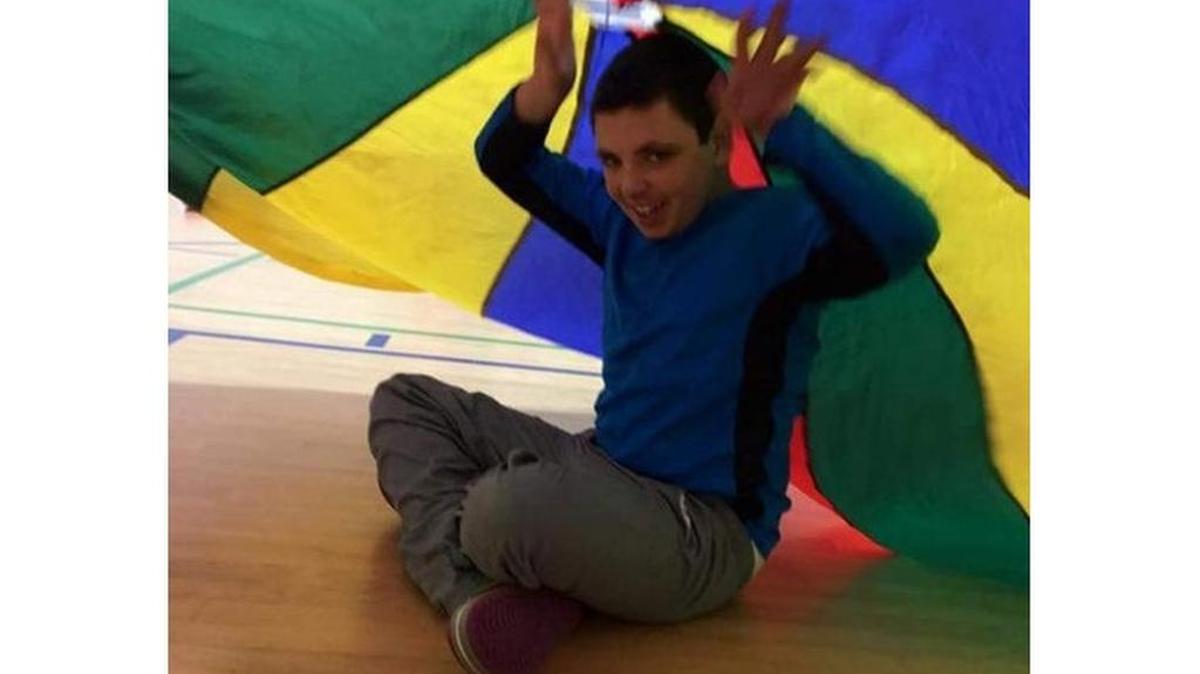 An autistic 20-year-old with the mind of a child, pictured before losing 40 pounds while in the care of a facility in Florence.