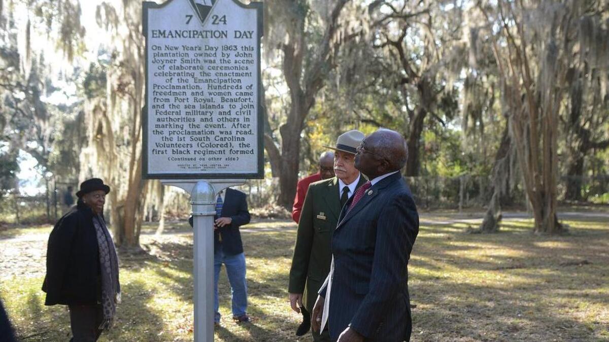 Congressman Jim Clyburn and other guests explore the Emancipation Day site during a tour of the relevant historical sites to the Reconstruction Monument Project on Dec. 15, 2016, on the United States Naval Hospital Beaufort campus in Port Royal.