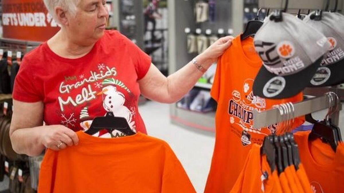 Martha Holmes of Anderson looks at Clemson gear at Academy Sports on Tuesday, December 13, 2016 in Anderson.