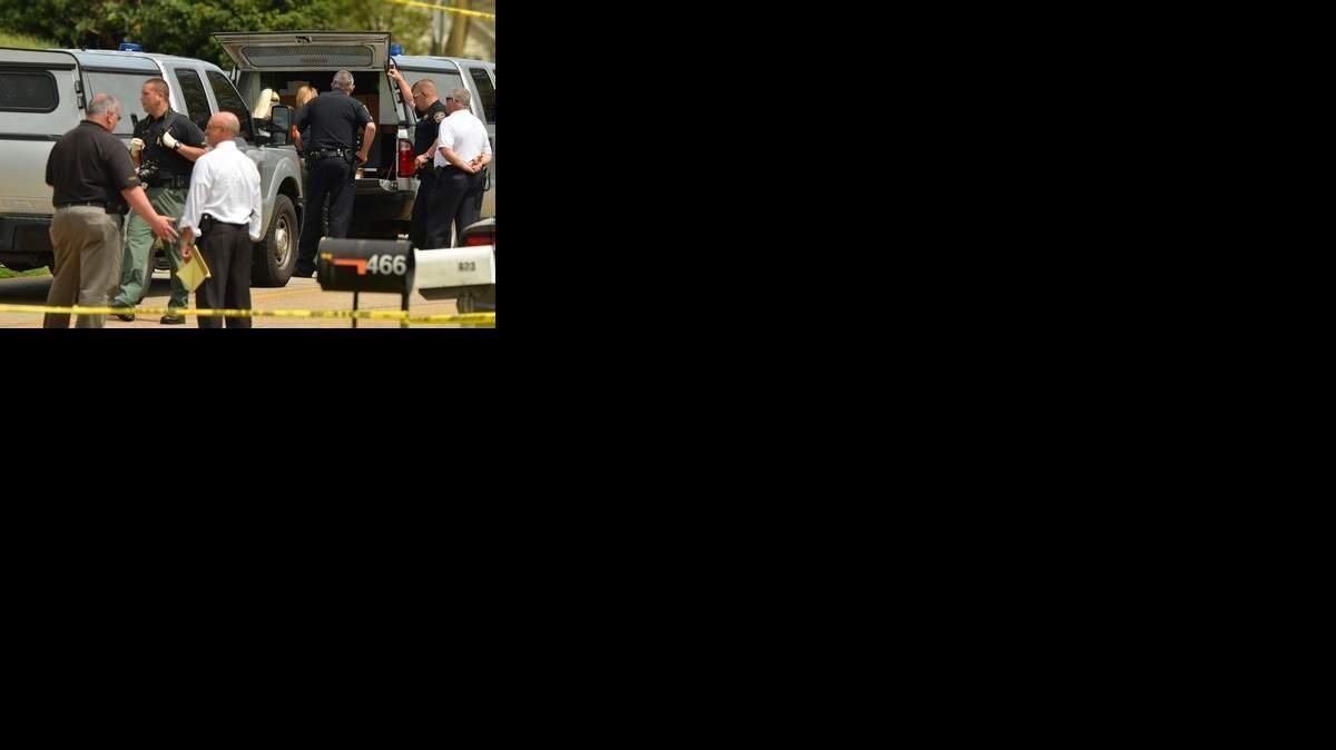 
Officers on the scene of a fatal officer-involved shooting in Boiling Springs on Thursday, April 9, 2015. 
