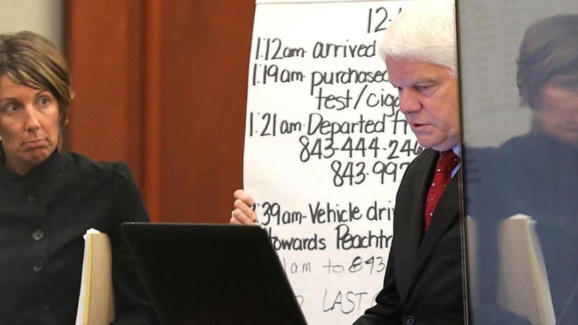 Assistant solicitor Nancy Livesay listens as witness Grant Fredericks uses a large television to show the jury how he arrived at believing light spread patterns from vehicle headlights are unique on day three of the Sidney Moorer kidnapping trial on Wednesday, June 22, 2016, at the Horry County Courthouse in Conway. Fredericks said he used video footage from a neighbor and business on Mill Pond Road to match all the reflective parts of Moorer's truck the night Heather Elvis was last seen in December 2013. Moorer and his wife Tammy Moorer are charged with kidnapping Heather Elvis. The state continued with its case Wednesday tracing calls and texts from the telephones believed to belong to Elvis and Sidney Moorer. Elvis was last seen on Dec. 18, 2013 and her car was found at Peachtree Boat Landing. Her telephone last pinged at the boat landing. No date has been set for Tammy Moorer's trial.