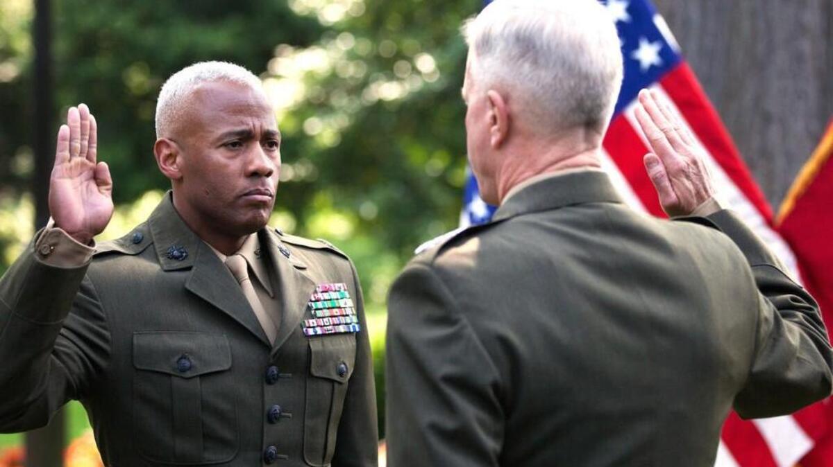 Brig. Gen. Terry V. Williams renewing his oath of enlistment during a promotion ceremony on May 27, 2014.