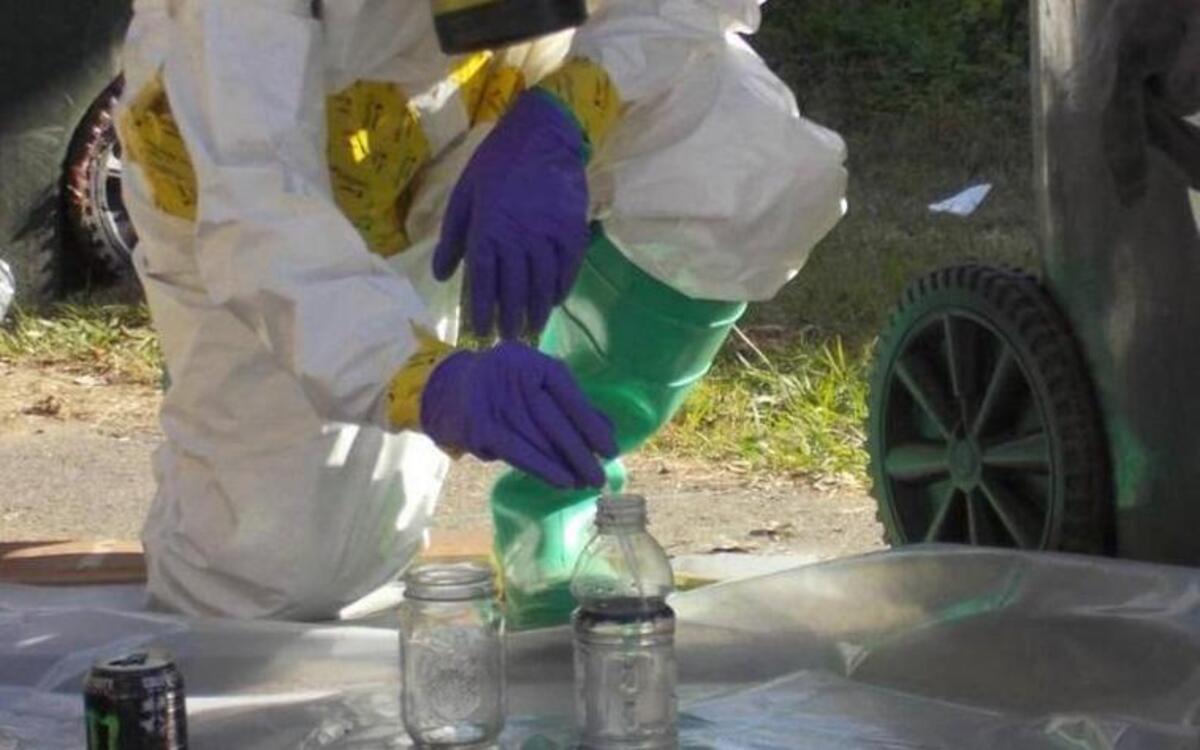 A hazardous materials team member helps clear the scene of a meth lab in York County. Additional personnel and special resources are required if a meth lab is active.