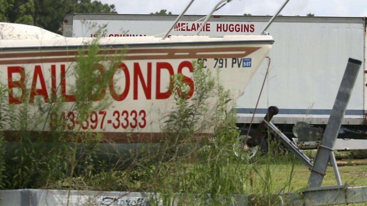 A truck is parked off U.S. 701 near the intersection of S.C. 65 by Homewood Depot and Grill. Painting on one side of the truck has been marked with black paint, but the other side has not been covered. The words on the truck are directed at “Melanie Huggins.” Huggins-Ward retired from her position as Horry County Clerk of Court. Renee Norris Elvis won the election for the clerk’s office on June 14.