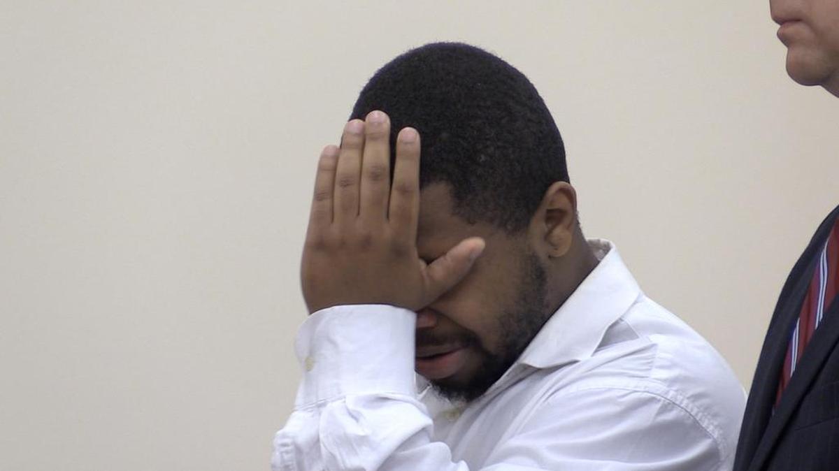 Merrilled Stewart wipes away a tear after pleading guilty to abducting and raping a Winthrop University student in 2011. The judge sentenced him to eight years in prison under a negotiated plea deal.