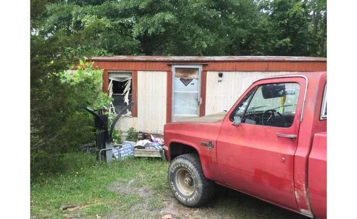 Police surrounded Fred Urey's trailer near Norris, SC, late Wednesday when his alleged kidnap victim fled by jumping out the front window.
