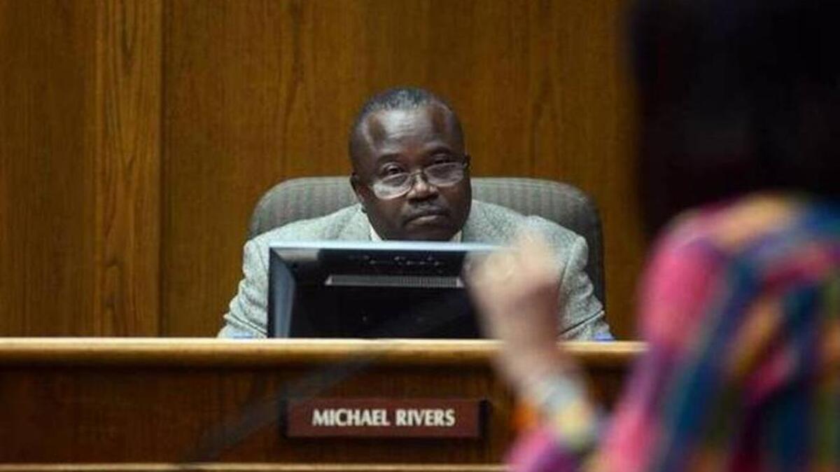 Beaufort County school board member Michael Rivers says a Veterans Affairs employee falsely reported that he made a gun threat against an unspecified facility.