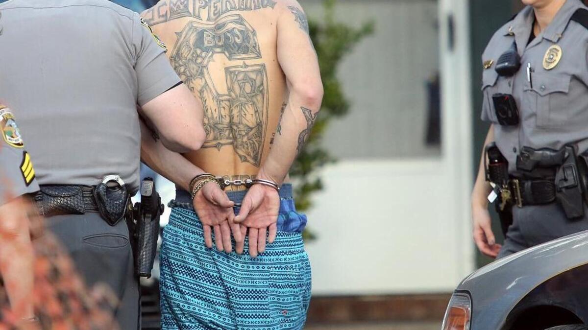 Horry County police take a suspect into custody in Surfside Beach.