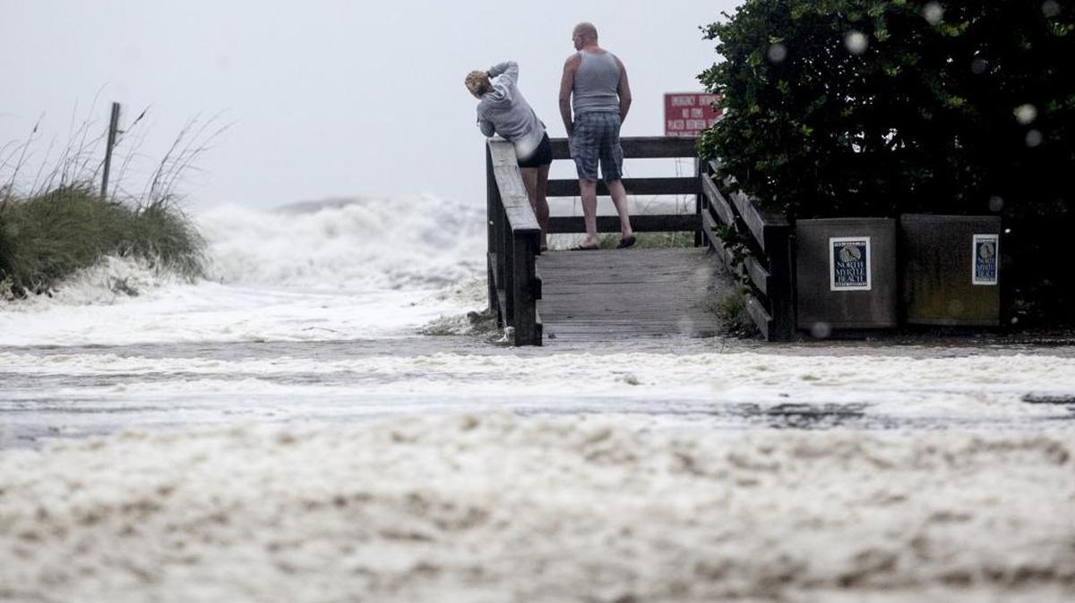 Residents came down to the beach in Cherry Grove to take photos of the huge waves brought on my Hurricane Matthew.