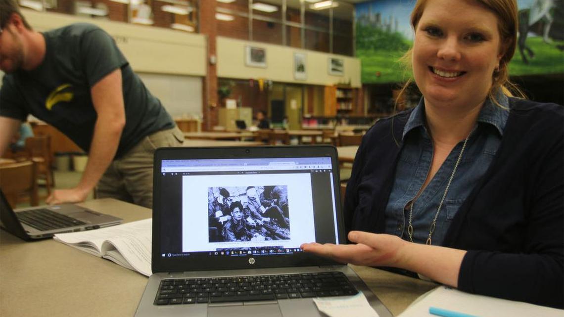 Anna Hasenkamp, seventh grade math teacher at Williams Middle School, loves to show her students images like these from D-Day because the men involved were so young. She says it usually hits close to home for the students.