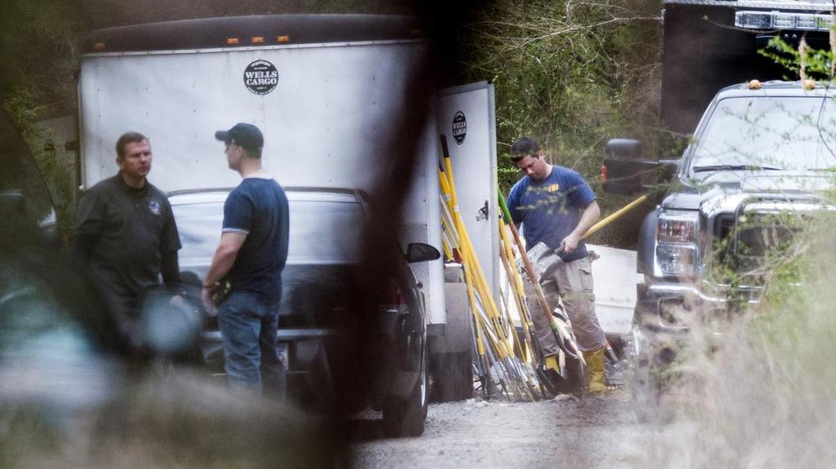 Agents from the Federal Bureau of Investigation appear to use shovels in the search connected to the Brittanee Drexel case off Foxfire Ct. in Georgetown on Saturday, March 25, 2017. Drexel was 17-years-old when she went missing in Myrtle Beach while on spring break in 2009.