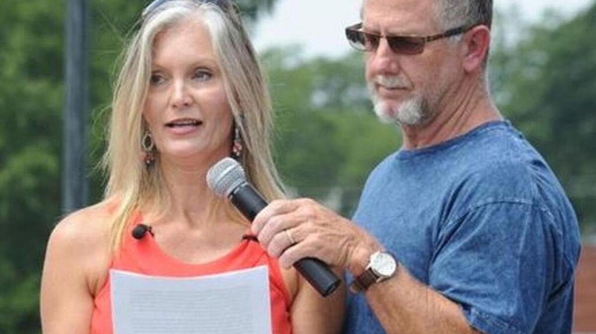 
Zach Hammond’s mother, Angie, speaks at a Rally for Justice for her son in Seneca. Holding the microphone is Zach’s father, Paul Hammond.
