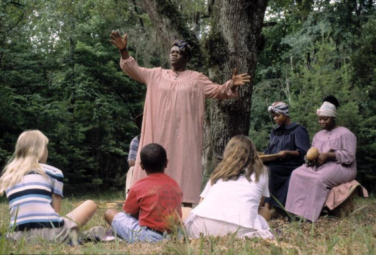 Gullah storytellers at Caw Caw Interpretive Center take students back to the 18th century in performances held under the oaks where slaves once lived and toiled.
