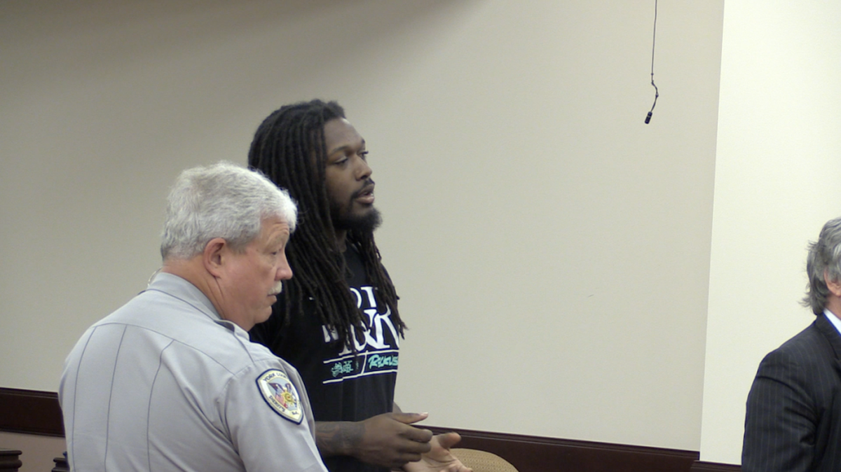 NFL player Jadeveon Clowney, left, appeared at a Thursday hearing to request bond for his father, David “Chilli Bean” Morgan, who is charged with shooting at two people at a Rock Hill strip club last August.