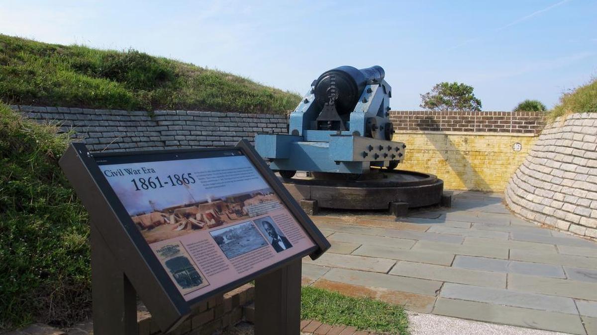 A Civil War-era cannon is seen on the wall of Fort Moultrie on Sullivans Island on Sept. 9. The fort is part of the Fort Sumter National Monument.