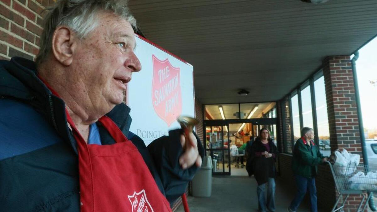 Salvation Army bell ringer James White rings his bell outside of Quality Foods in Anderson. He's been out in the community to welcome Christmas shoppers every year since 1995, typically ringing the bell for 40 hours a week.