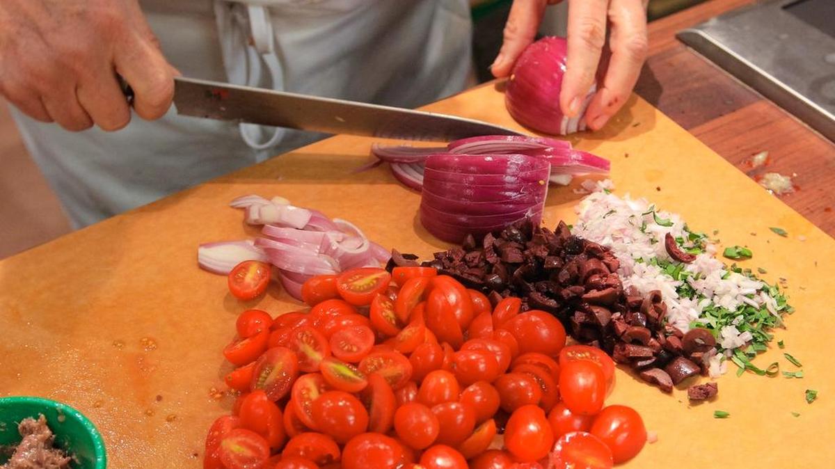 FILE PHOTO: Preparing the ingredients for Nicoise Pasta Salad.