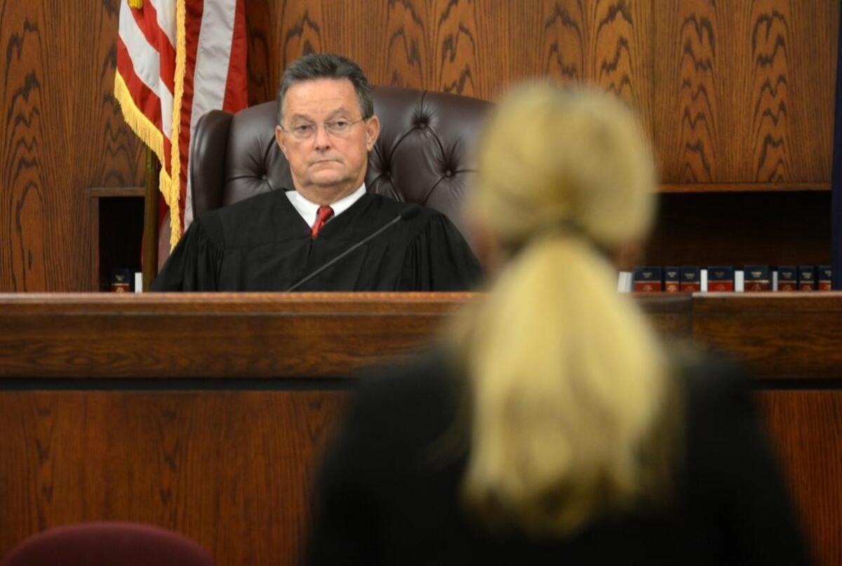 Circuit Court Judge Michael Nettles speaks with 14th Circuit Assistant Solicitor Hunter Swanson about the rule of law before closing arguments during the second day of the trial for Jasmine Femia on Wednesday, August 24, 2016, at the Beaufort County Courthouse in Beaufort. Femia was charged with conspiracy and murder in the shooting death of Nicholas Degros on January 9, 2015.