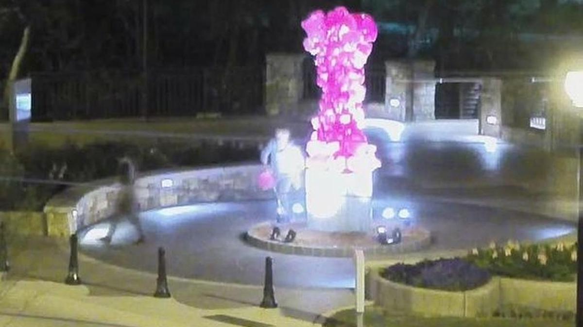 Investigators determined two individuals vandalized the statue about 12:41 a.m. April 4.