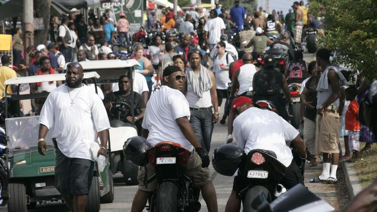 Crowds, vendors and motorcycles fill the streets of Atlantic Beach during the 2010 Atlantic Beach Bike Fest.