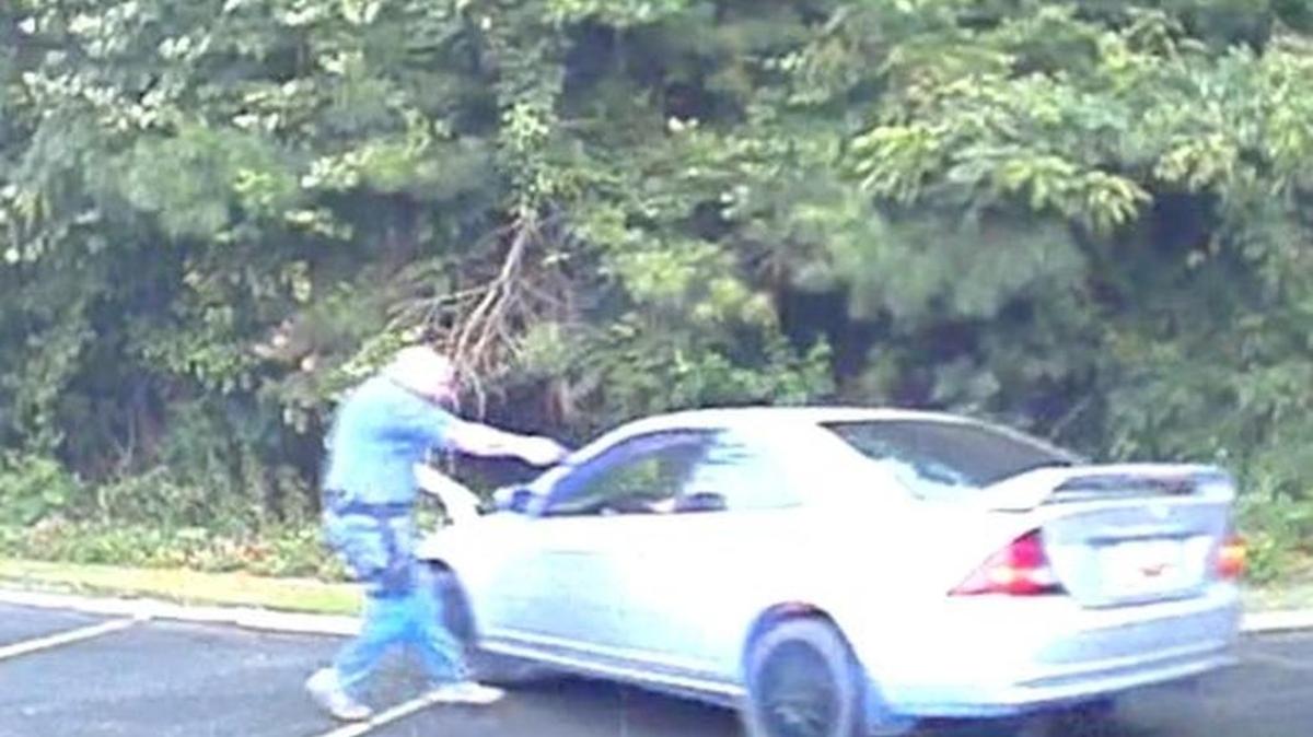 Still images from dashcam video shows Lt. Mark Tiller outside of Zachary Hammond's car and the fatal shots in the parking lot of Hardee’s in Seneca on July 26, 2015.